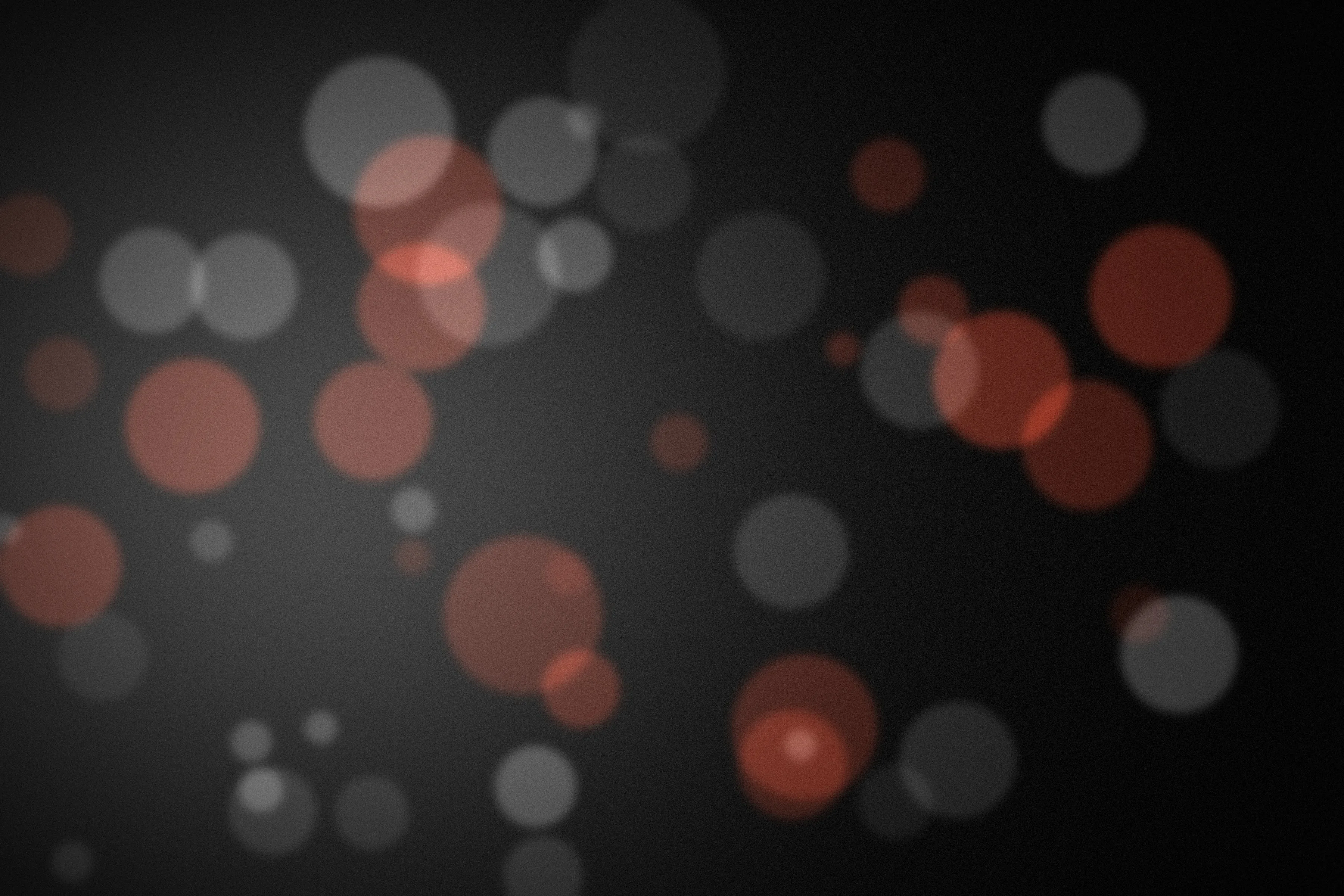 Placeholder: grey and red bokeh